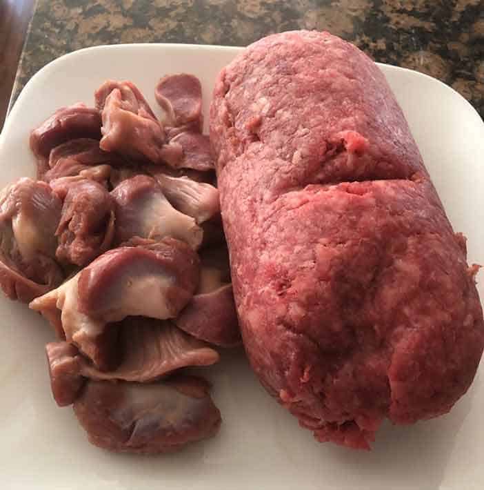 Chicken gizzard and mince beef on the white plate